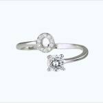 Elegant open circle and solitaire diamond ring in white gold