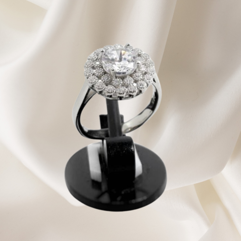 Radiant Halo Silver Ring with a sparkling round-cut centerpiece surrounded by smaller stones